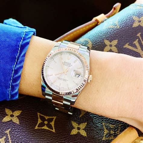 rolex on woman's wrist